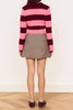 knit cardigan in hot pink and burgundy stripes with a shrunken fit