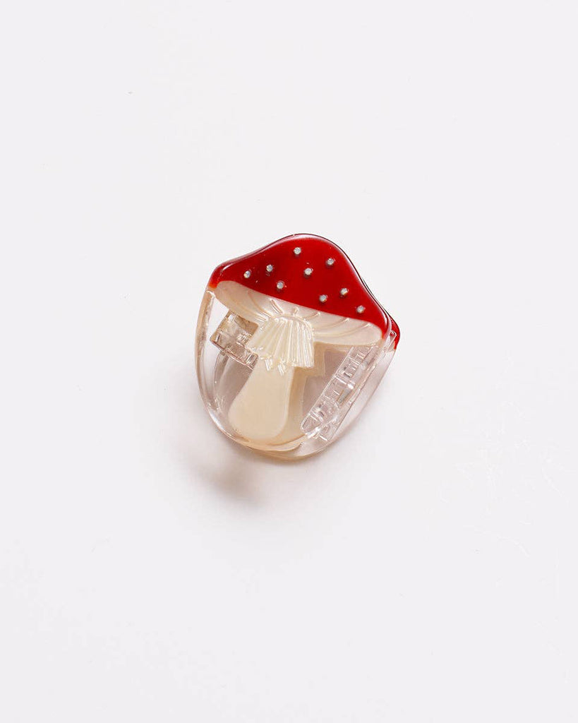 petite hair claw in the shape of a red mushroom 