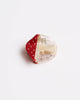 petite hair claw in the shape of a red mushroom 