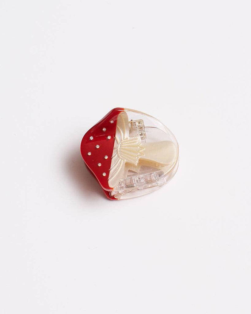petite hair claw in the shape of a red mushroom 
