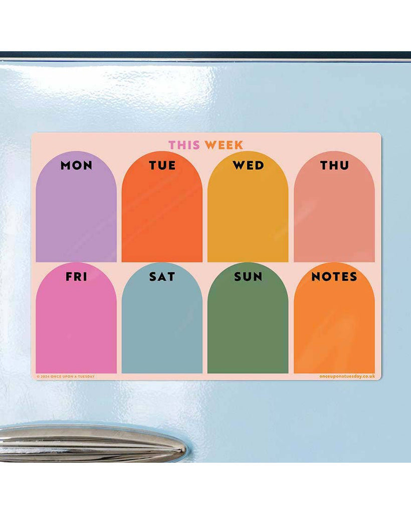 magnetic weekly planner with a colorful rainbow arch design