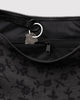 baggu medium nylon crescent bag in a charcoal grey ditsy floral pattern