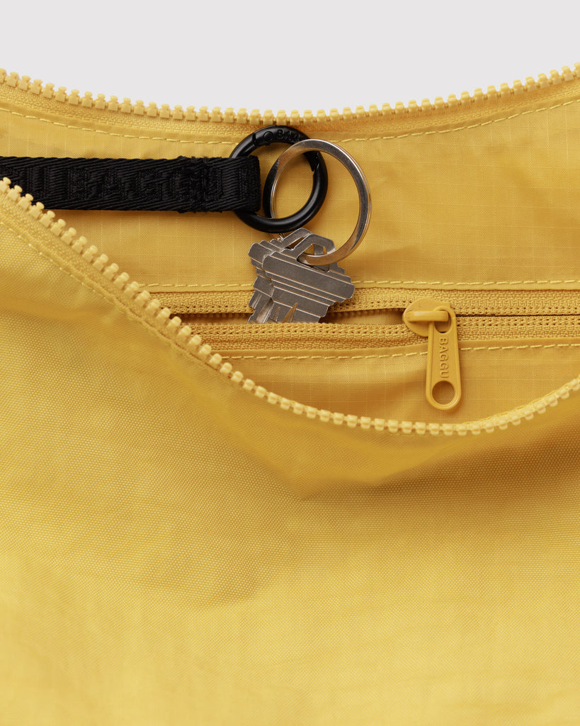 baggu medium nylon crescent bag in sunflower yellow