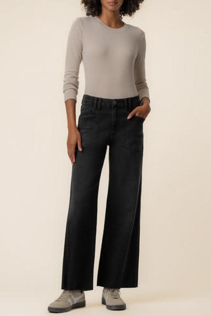 washed black wide leg jeans with unique inset pockets.