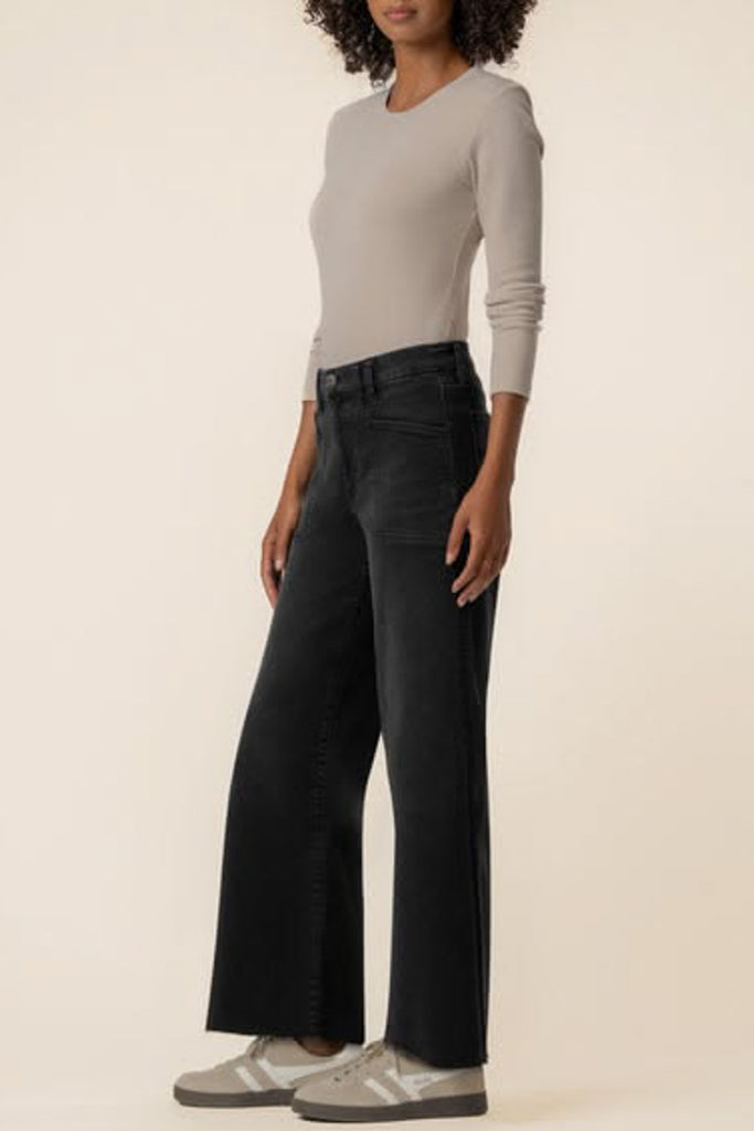 washed black wide leg jeans with unique inset pockets.