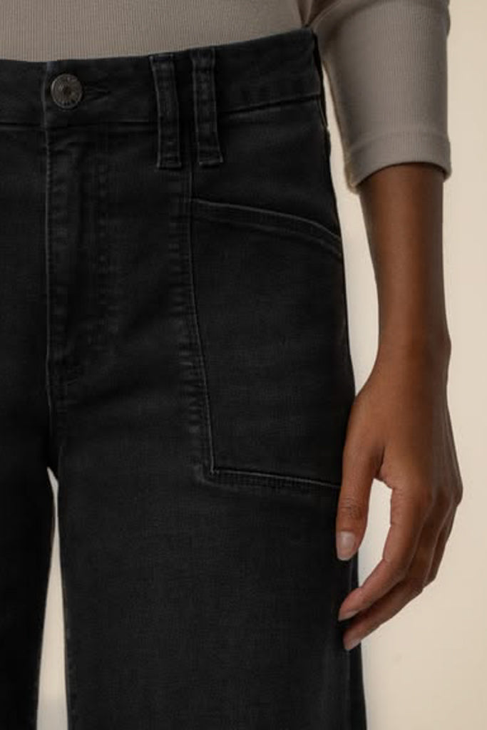 washed black wide leg jeans with unique inset pockets.