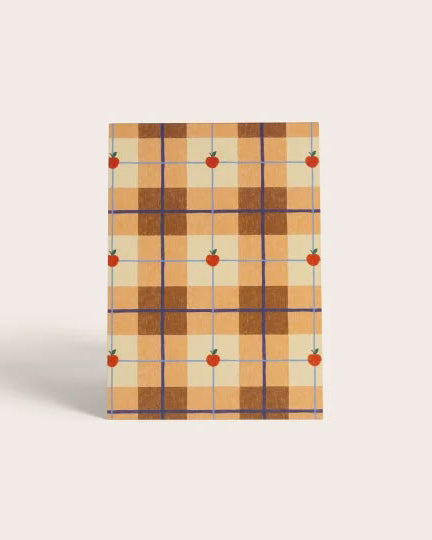 memo pad in a quilted apple pattern