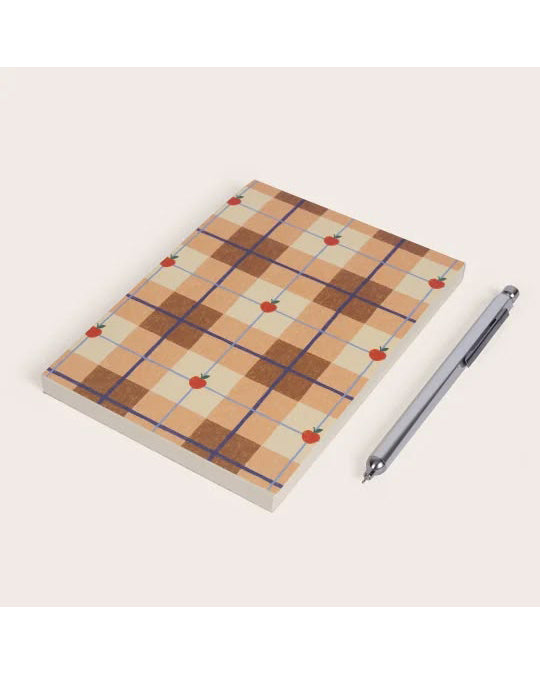 memo pad in a quilted apple pattern