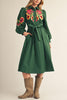 dark green midi dress with colorful floral embroidered details
