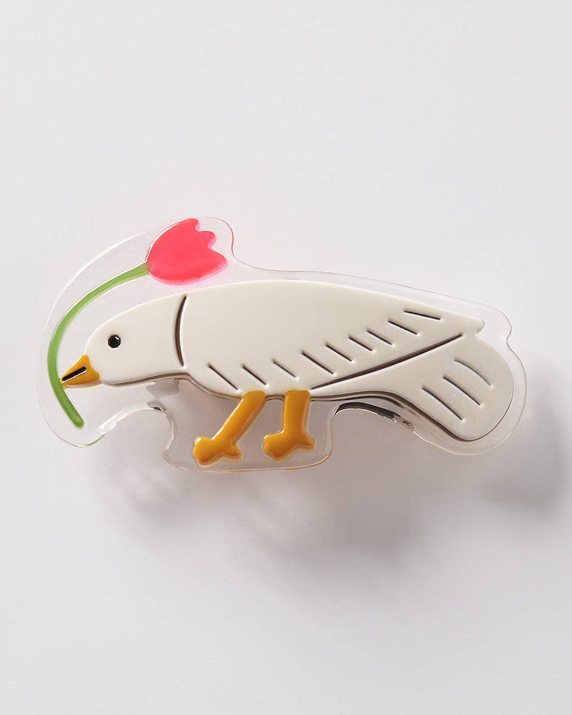mini french barrette featuring a dove picking a flower