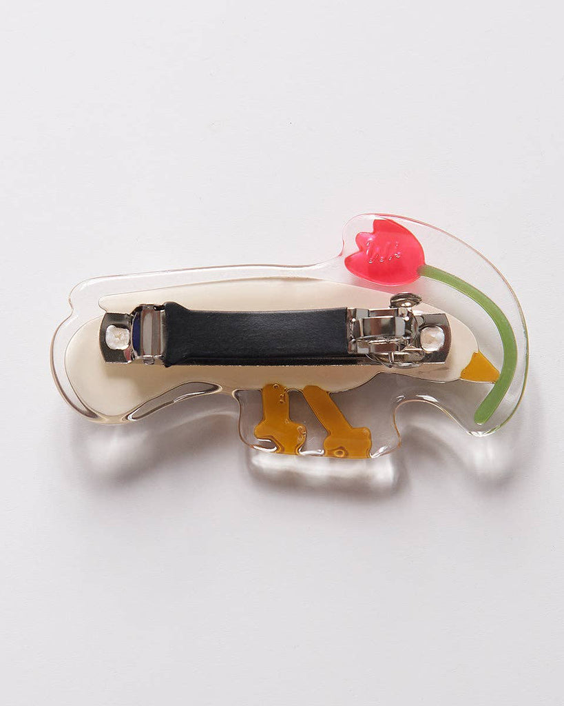 mini french barrette featuring a dove picking a flower, reverse side 