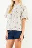 button down top in a grid plaid pattern with lovely embroidered floral details throughout