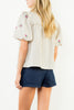 button down top in a grid plaid pattern with lovely embroidered floral details throughout