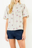 button down top in a grid plaid pattern with lovely embroidered floral details throughout
