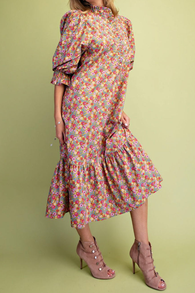 easy to wear midi dress in a sage green, lilac, and pink floral pattern