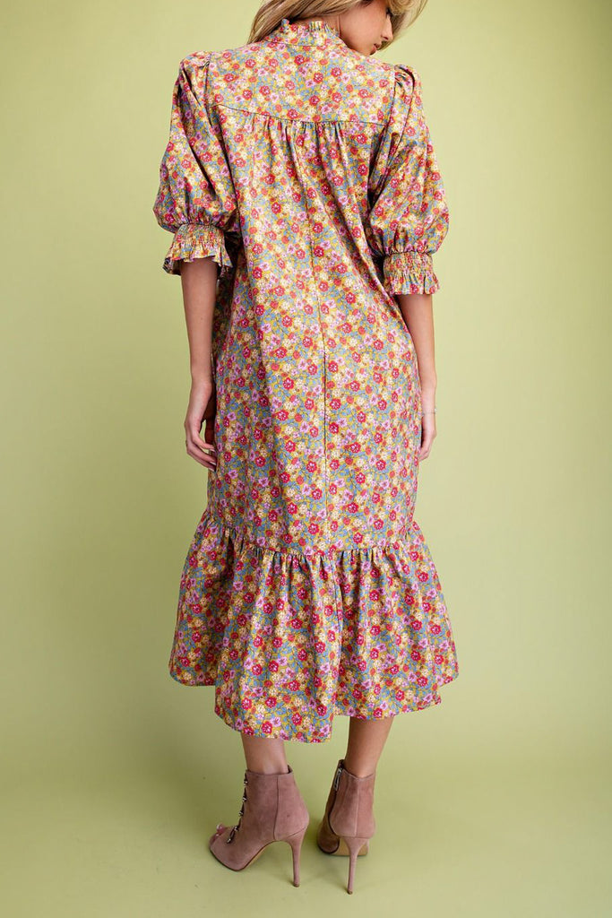 easy to wear midi dress in a sage green, lilac, and pink floral pattern
