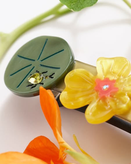 french barrette with green leaves, yellow nasturtiums, and bejeweled beetles