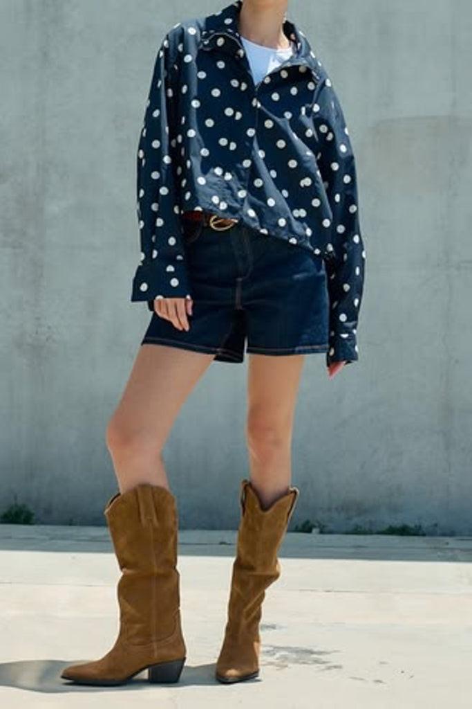 navy blue zip up jacket with cute polka dots throughout