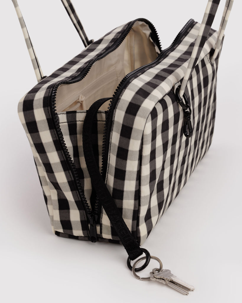interior shot of nylon bowler bag in black and cream gingham