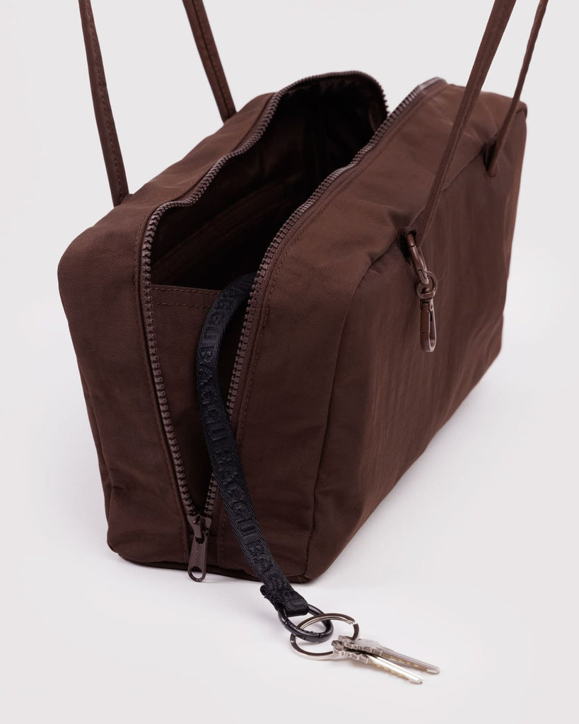 interior shot of nylon bowler bag in coffee