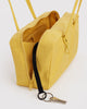 interior shot of nylon bowler bag in sunflower yellow