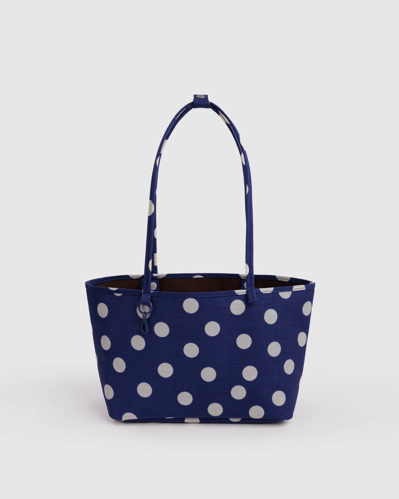 reversible nylon tote bag size medium in navy polka dot mix from baggu
