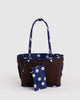 reversible nylon tote bag size medium in navy polka dot mix from baggu