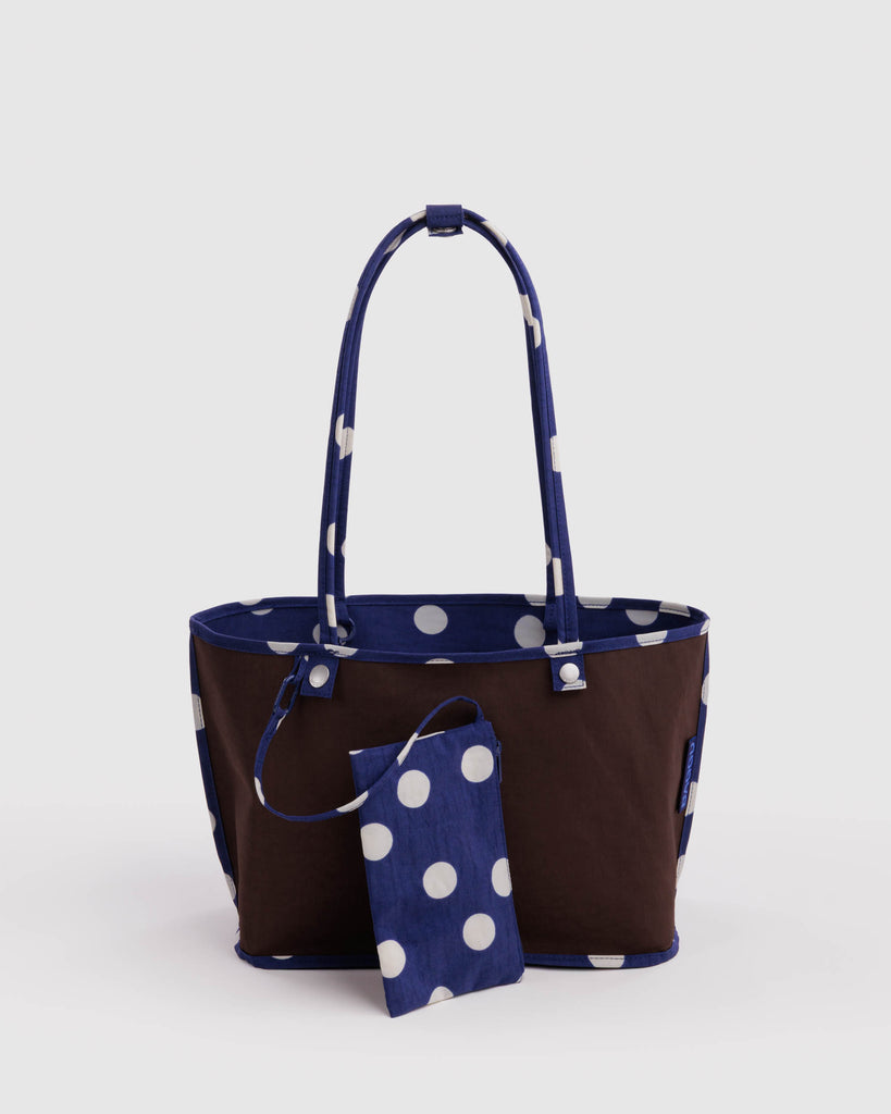 reversible nylon tote bag size medium in navy polka dot mix from baggu
