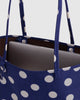 reversible nylon tote bag size medium in navy polka dot mix from baggu