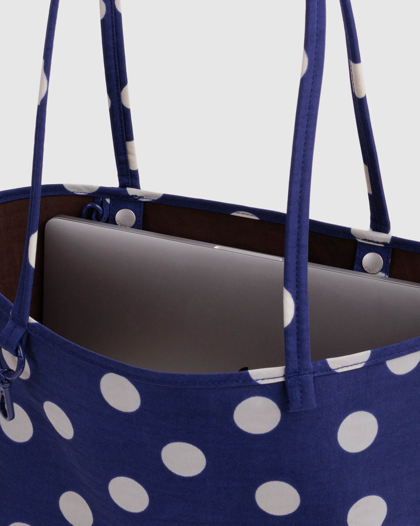 reversible nylon tote bag size medium in navy polka dot mix from baggu