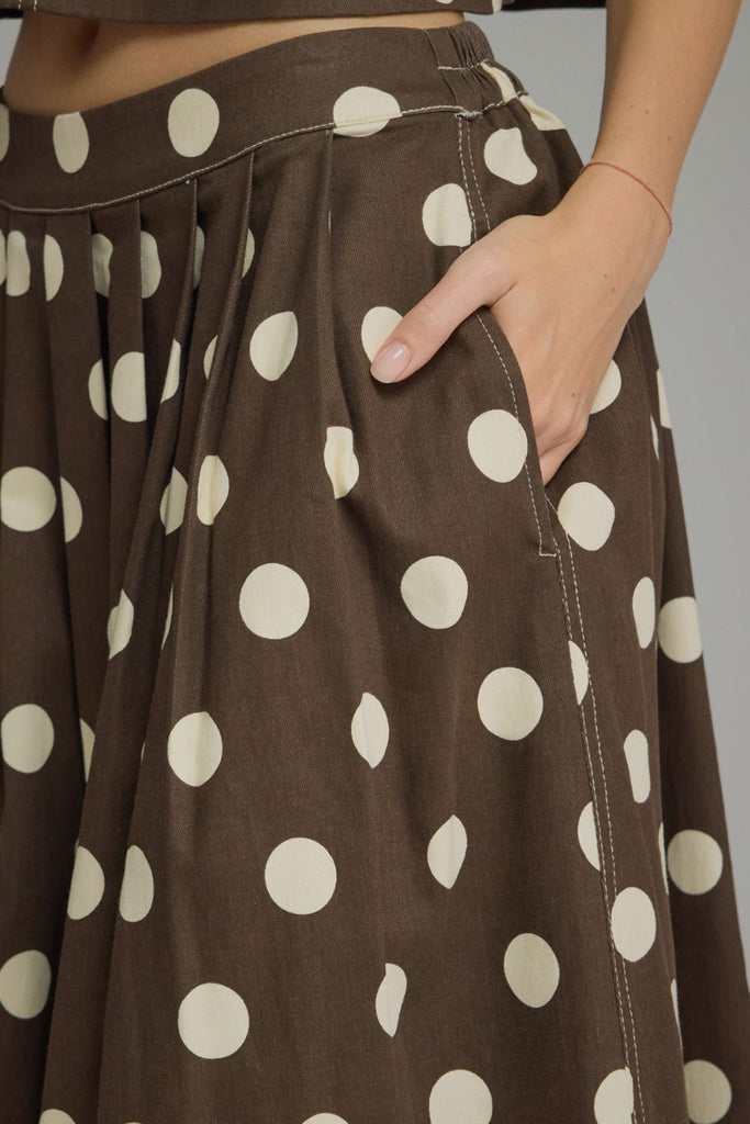 a-line midi skirt in chocolate brown with cute polka dots throughout