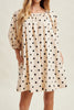 flowy mini dress in cream with cute black polka dots throughout