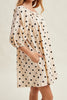 flowy mini dress in cream with cute black polka dots throughout