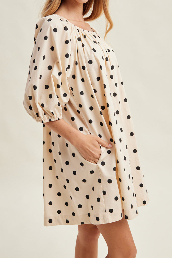 flowy mini dress in cream with cute black polka dots throughout