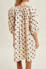 flowy mini dress in cream with cute black polka dots throughout
