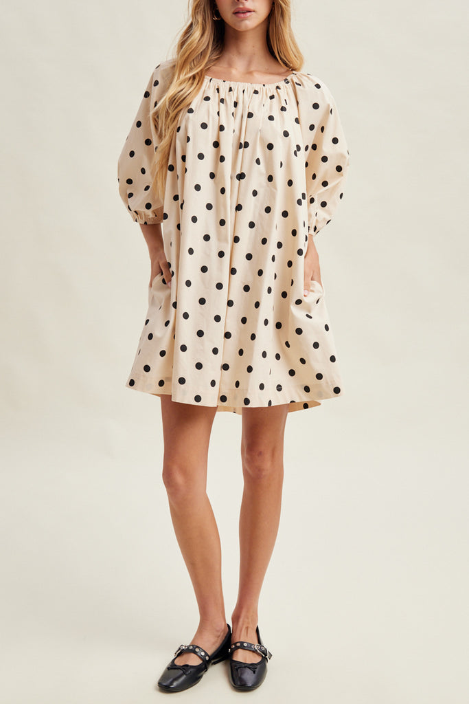 flowy mini dress in cream with cute black polka dots throughout