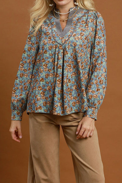 pretty floral blouse made from a grey-hued baby corduroy