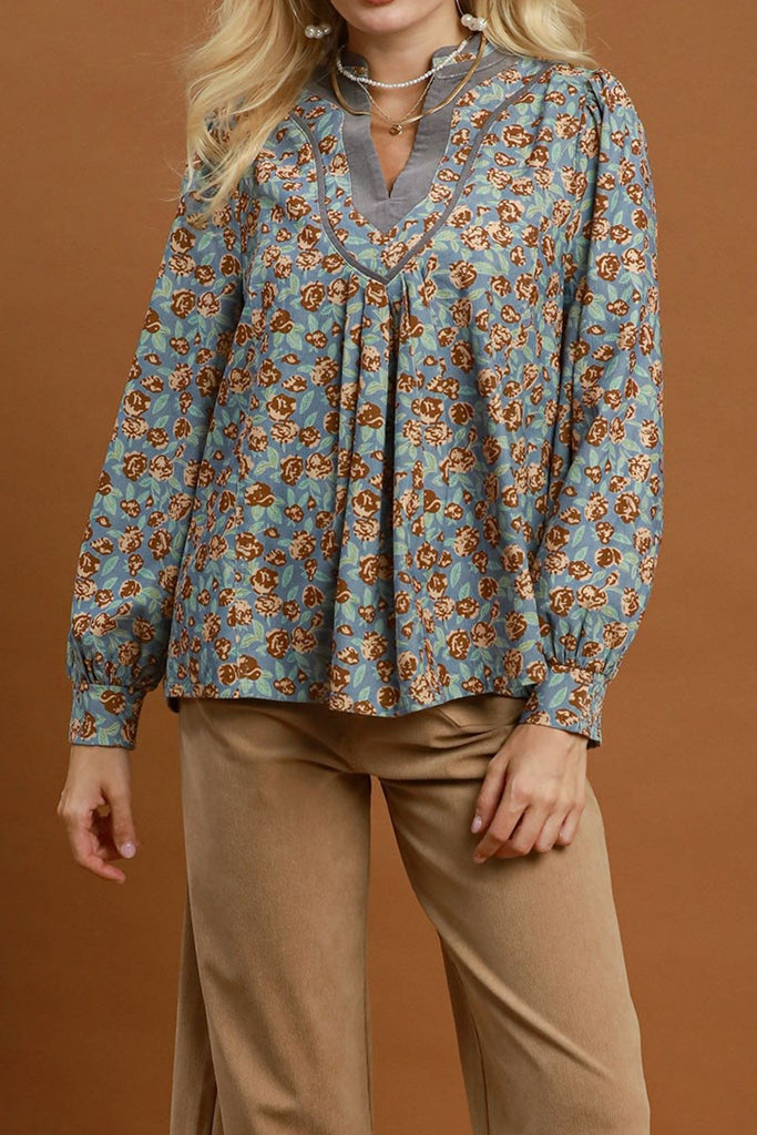 pretty floral blouse made from a grey-hued baby corduroy