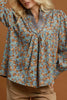 pretty floral blouse made from a grey-hued baby corduroy