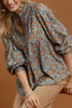 pretty floral blouse made from a grey-hued baby corduroy