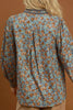 pretty floral blouse made from a grey-hued baby corduroy