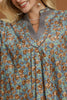 pretty floral blouse made from a grey-hued baby corduroy