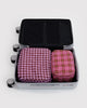nylon packing cube set in colorful plaid prints