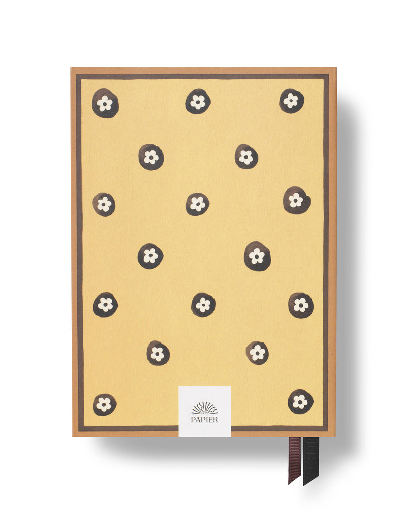 hardcover page a day planner with daisy cover and  ribbon markers
