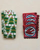 paper napkins with a green christmas tree pattern