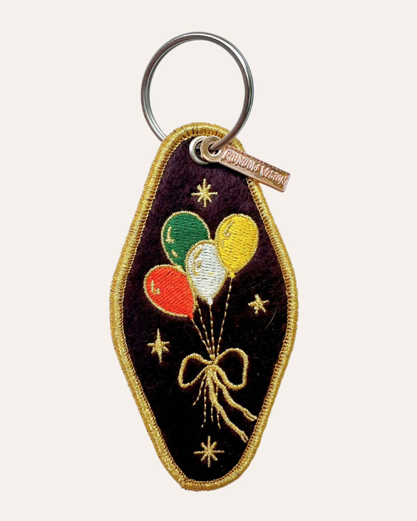 embroidered patch keychain with a vintage-inspired design, balloons