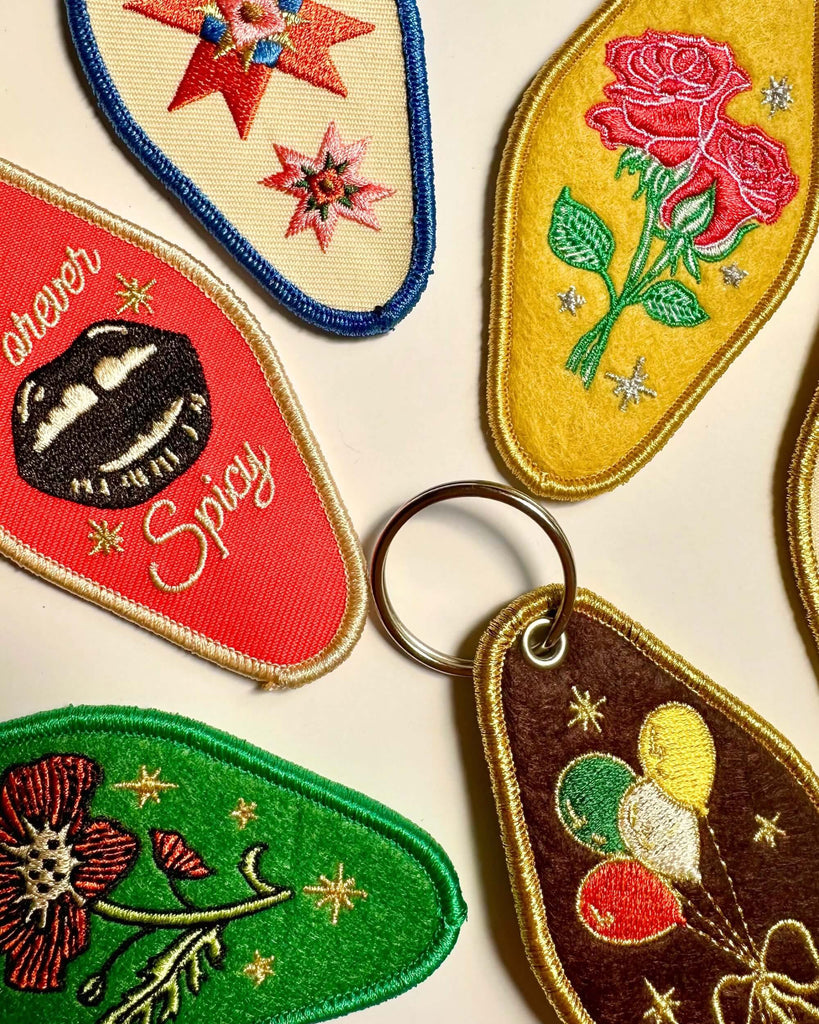 embroidered patch keychains with a vintage-inspired design