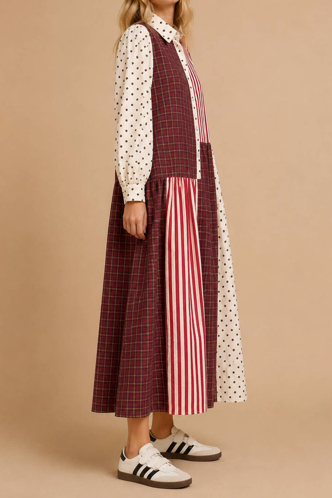 striking maxi dress with a mix print design in burgundy, black, pink, and white