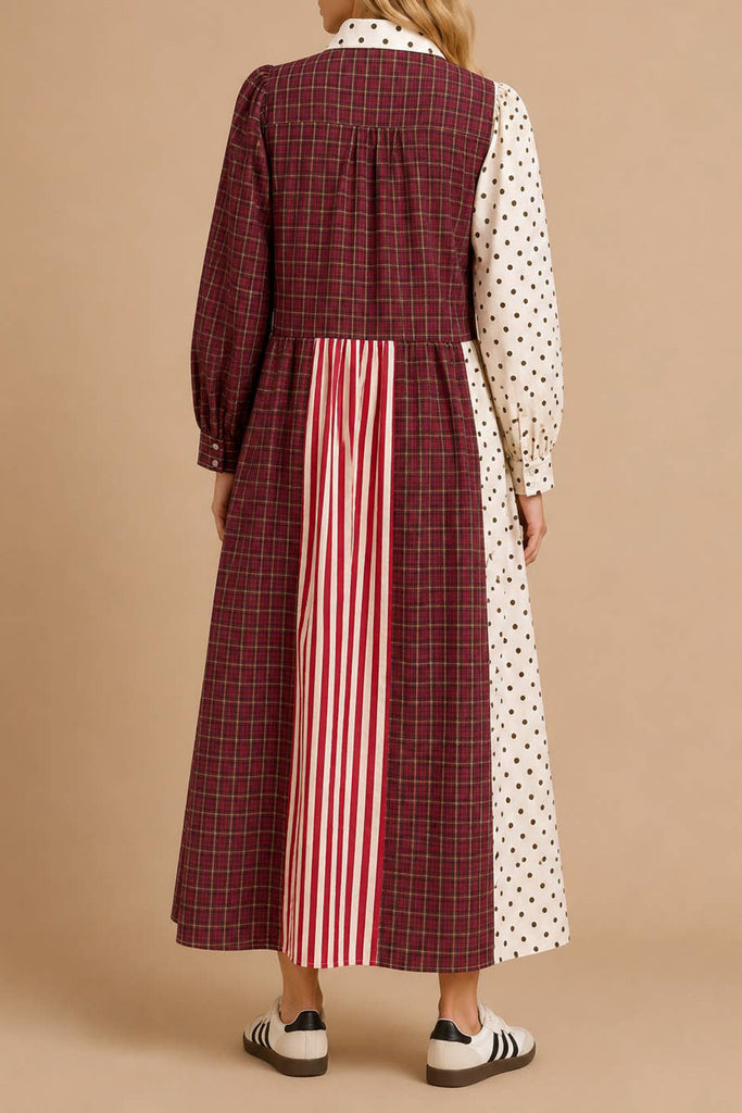 striking maxi dress with a mix print design in burgundy, black, pink, and white