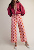 cropped wide leg pants in baby pink with colorful polka dots 